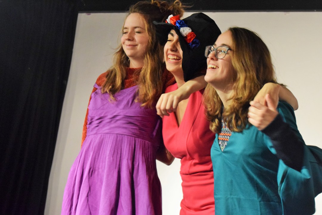 The sisters enjoy a moment of relief and happiness uncovering the forgotten gems in their mother's wardrobe.