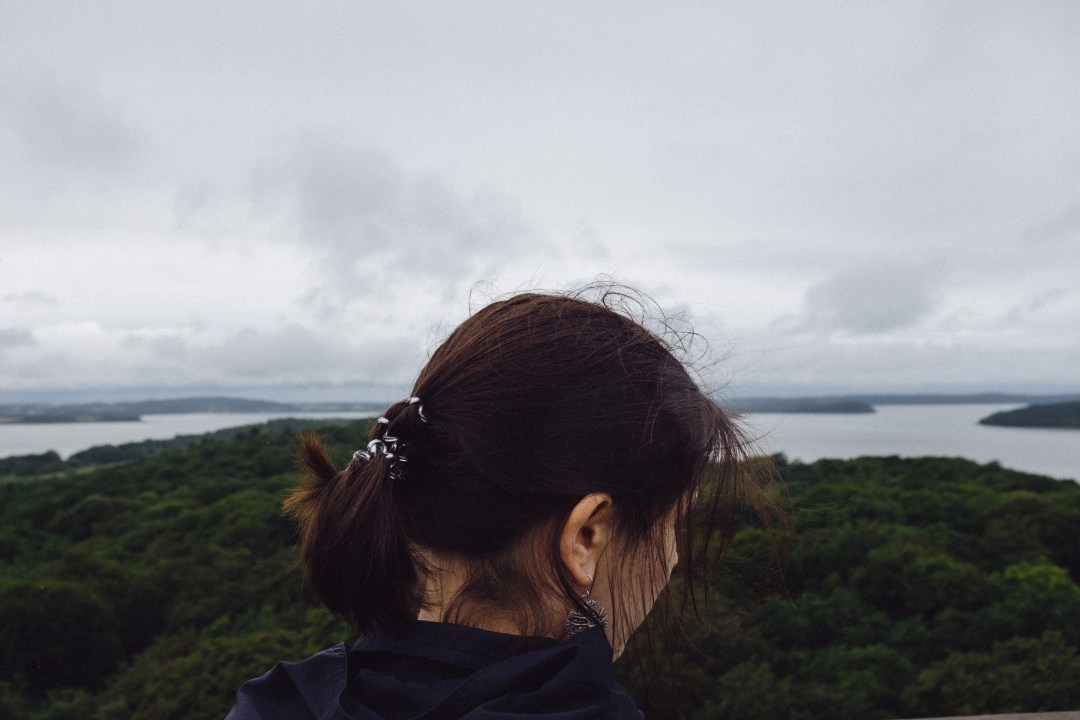 Young woman looking at the sea